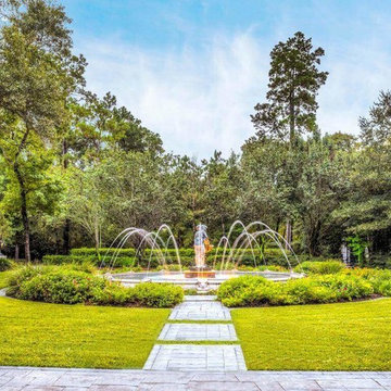 Re-circulating Fountains with bronze statue