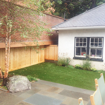 Cedar gate (storage space) and cedar wall cladding