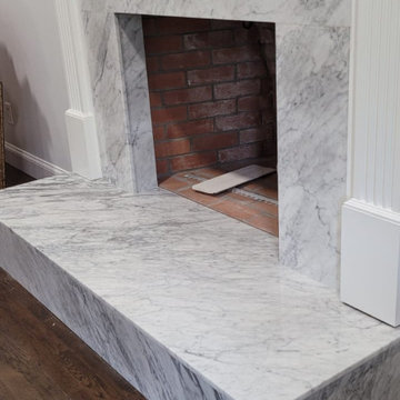 2x White Carrara Marble Fireplaces