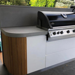 Outdoor Kitchen with a polished concrete benchtop & stainless steel doors. - Kitchen And Dining Furniture