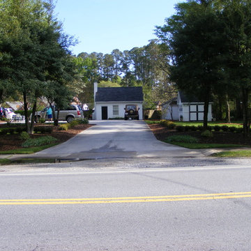 Symetrical Driveway entry updated with new matching Yaupon Holly Hedges