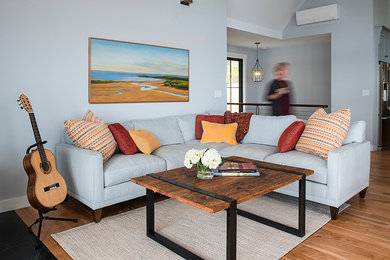 Transitional open concept living room photo in Portland Maine