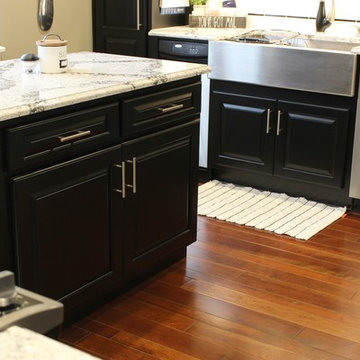 Small Island Kitchen with Black Painted Cabinetry in Taylor Ridge, IL