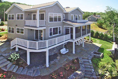 Elegant gray three-story exterior home photo in Burlington