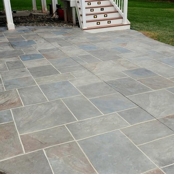 Backyard patio with Multi-Color & grouted stamped concrete