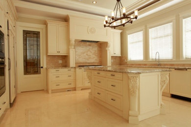 Mid-sized elegant u-shaped ceramic tile open concept kitchen photo in Vancouver with an undermount sink, flat-panel cabinets, white cabinets, quartz countertops, beige backsplash, mosaic tile backsplash, stainless steel appliances and an island