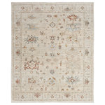 Nourison - Nourison Traditional Home 8'6" x 11'4" Beige Vintage Indoor Area Rug - Set the tone for rest and relaxation with this vintage-inspired beige rug from the Traditional Home Collection. Classic Persian motifs are reinvented with transitional styling, then finished with short fringe edges. The machine-made polypropylene construction boasts performance and durability, resulting in a shed-free rug that cleans up easily with regular vacuuming and spot cleaning with a damp washcloth.