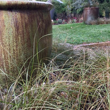 Ceramic water feature and carex