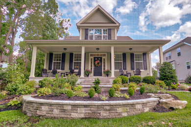 Craftsman green three-story house exterior idea in Philadelphia