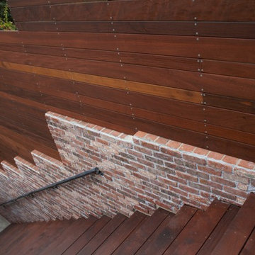 Modern backyard pool deck fence