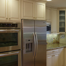 Oven/Refridge adjacent...thin dividing wood