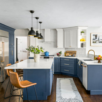 Contemporary Kitchen With Blue Cabinetry and Large Island