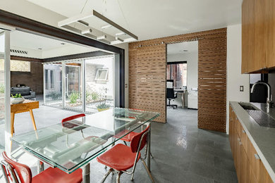 Example of a minimalist dining room design in Phoenix