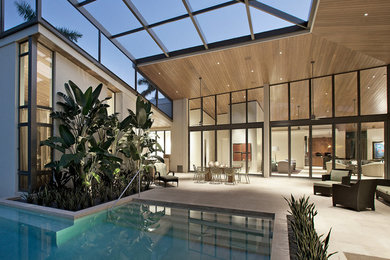 Design ideas for a contemporary patio in Miami.
