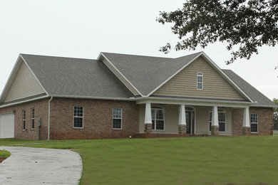 Example of a classic exterior home design in Other