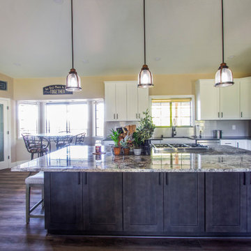 Spacious kitchen remodel using warm taupe, white and brown tones