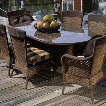 Lloyd Flanders Grand Traverse Wicker Umbrella Dining Table 84" Oval With Lay on