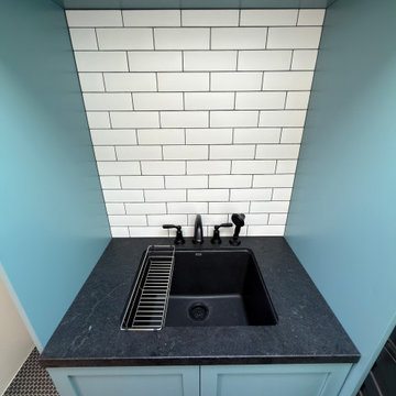 Compact Laundry and Utility Area with Built-In Sink
