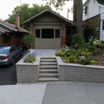 Front Entrance Transformation with Retaining Walls & Lighting