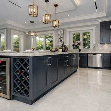 Storm Grey Luxury Kitchen Renovation Custom Cabinetry & Quartz Waterfall Island