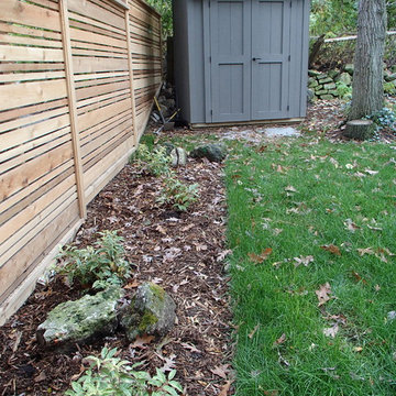 Terraced Backyard - new custom shed and easy colourful plant material