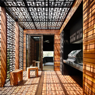 メルボルンの中サイズのコンテンポラリースタイルのおしゃれな裏庭のデッキ (パーゴラ、アウトドアキッチン) の写真