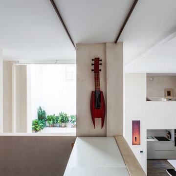 Bodega convertida en dos apartamentos dúplex. Arq.: Ramón Gómez