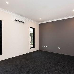 Example of an island style home theater design in Darwin