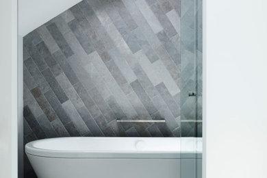 Design ideas for a contemporary bathroom in Sydney with a freestanding tub.