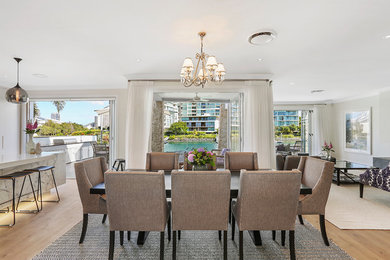 This is an example of a large modern open plan dining in Gold Coast - Tweed.