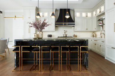 Eat-in kitchen - mid-sized contemporary l-shaped medium tone wood floor and brown floor eat-in kitchen idea in Toronto with an undermount sink, flat-panel cabinets, gray cabinets, quartz countertops, white backsplash, quartz backsplash, paneled appliances, an island and white countertops