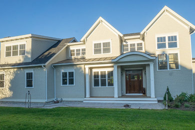 Large craftsman gray two-story wood exterior home idea in Burlington