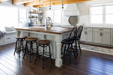 Eat-in kitchen - large farmhouse l-shaped dark wood floor, brown floor and exposed beam eat-in kitchen idea in Portland Maine with a farmhouse sink, shaker cabinets, gray cabinets, marble countertops, white backsplash, shiplap backsplash, stainless steel appliances, an island and white countertops