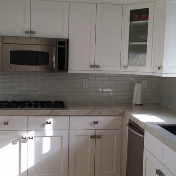 Kitchen Renovation of cabinets with full overlay and counter tops.