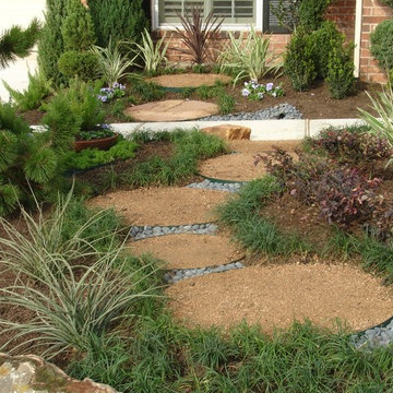 Landscaping with oversize pavers and backyard creek - hkns