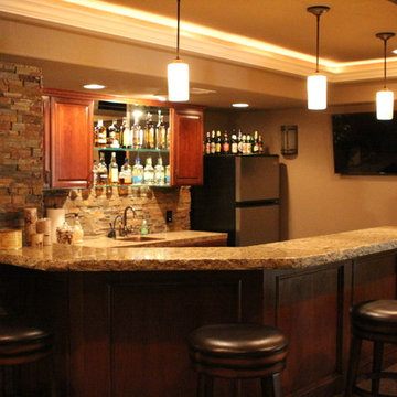 Eye-popping Denver Basement Remodel with hidden bookcase doors and tray ceilings