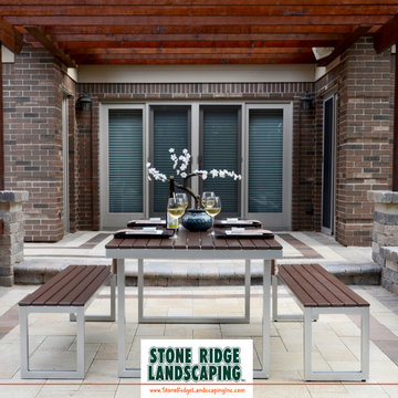 Modern Unilock Paver Patio with Cedar Pergola
