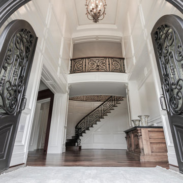 Project #74 | Circular Staircase with Hand-Forged Metal Panels