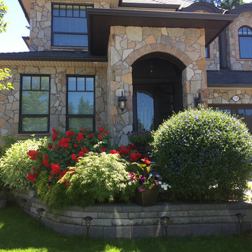 Stained and painted a rich chocolate brown. Repaired Stonework
