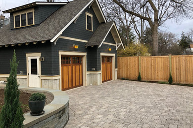 Inspiration for a mid-sized craftsman detached two-car garage workshop remodel in New York