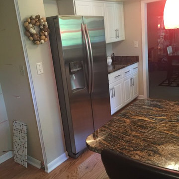 cabinet refacing with glass tile backsplash