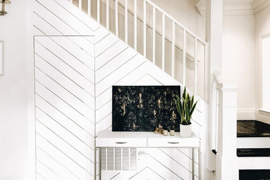 Transitional multicolored floor double front door photo in Miami with white walls and a black front door