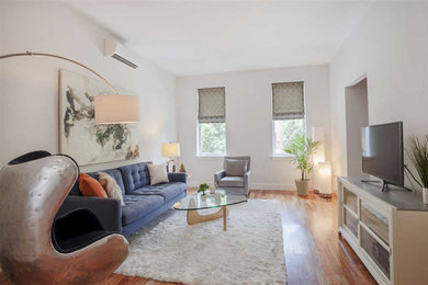 Minimalist living room photo in New York