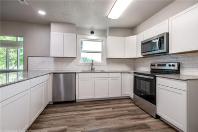 Example of a minimalist kitchen design in Other