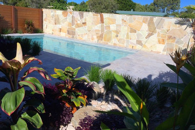 Design ideas for a beach style pool in Sunshine Coast.