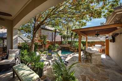 This is an example of a mediterranean backyard landscaping in Dallas.