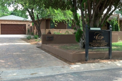 Transitional one-story mixed siding exterior home idea in Phoenix