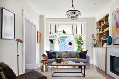 Living room - mid-sized contemporary formal and enclosed dark wood floor and beige floor living room idea in Toronto with white walls, a standard fireplace, a stone fireplace and a media wall