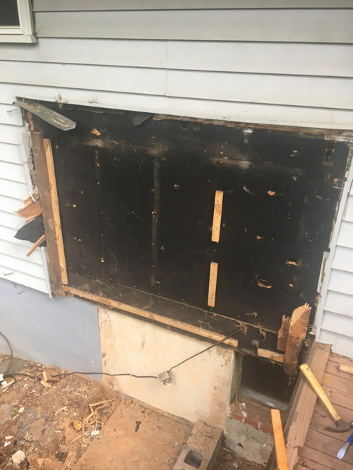 What to put under vinyl siding?