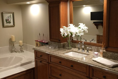 Large transitional master bathroom photo in Other with recessed-panel cabinets, quartz countertops and an undermount sink